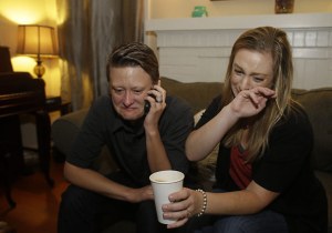 Lisa Kirk, left, and Lena Brancatelli react to the U.S. Supreme Court's ruling on gay marriage ERIC RISBERG / AP